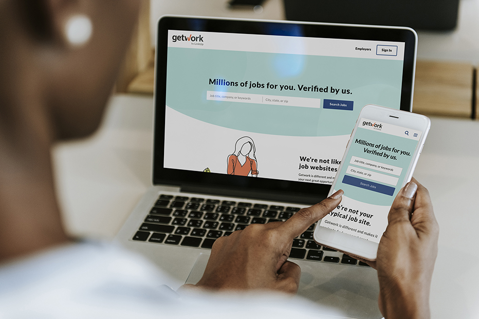 Woman viewing a site built by WebVolta on both desktop and mobile